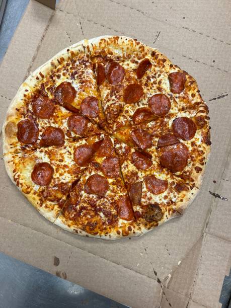 istock Top view of pepperoni pizza 1387943866