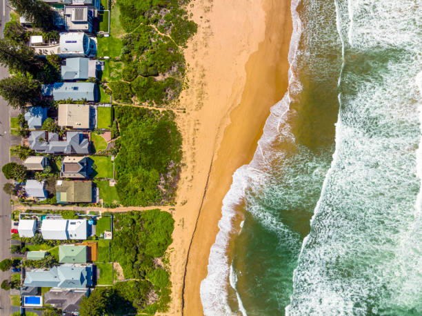 istock Coastal Suburb overhead perspective roof tops 1387944064