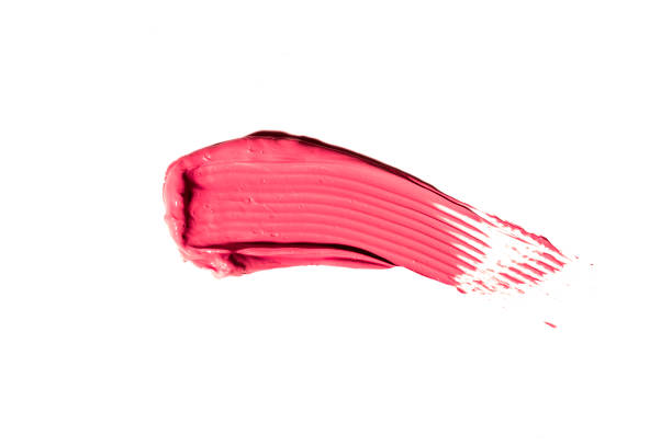 istock Pink matte lipstick, smear texture on a white background 1387948241