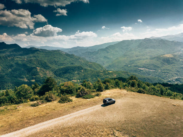 Castelluccio di Norcia, Italy - July 9th, 2020 : The New Land Rover Defender stationery in the countryside