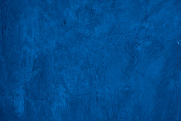istock Old wall pattern texture cement blue dark abstract  blue color design are light with black gradient background. 1387957380