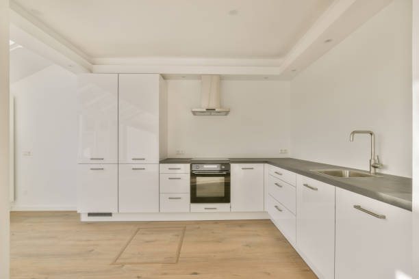 istock Interior of a small kitchen in a white design 1387965801