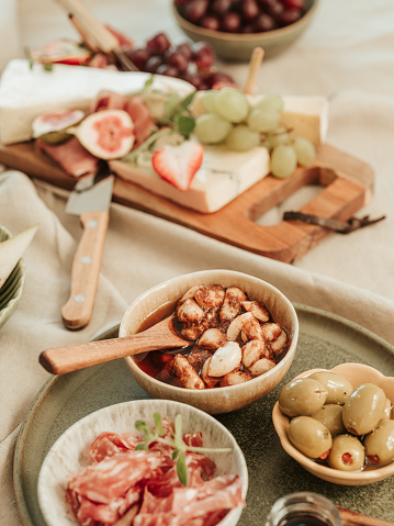 Cheese and meat cold cuts platter tapas food still life
Photo taken indoors in natural light