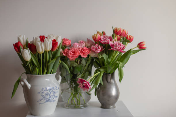 istock bouquets of spring flowers are in vases 1387973201