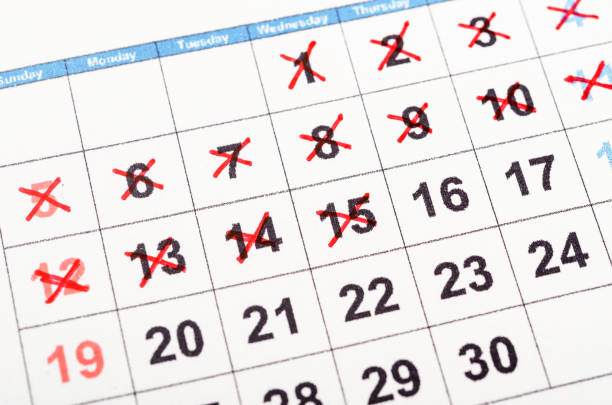 istock Red cross mark on the calendar 1387975741