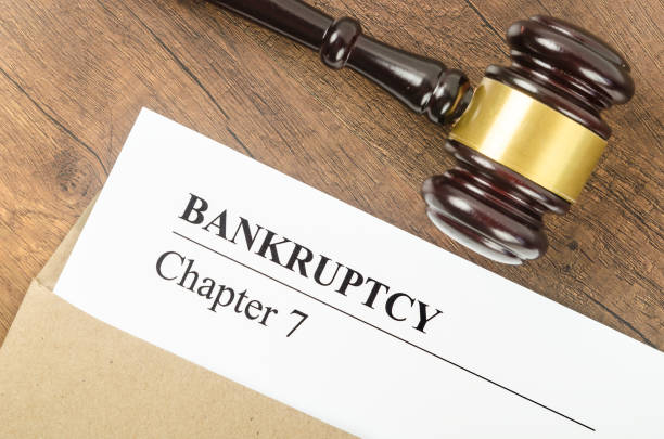istock Gavel and bankruptcy law documents. 1387975776