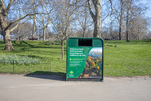 Garbage Bin at Hyde Park in City of Westminster, London, with an image visible on the bin.