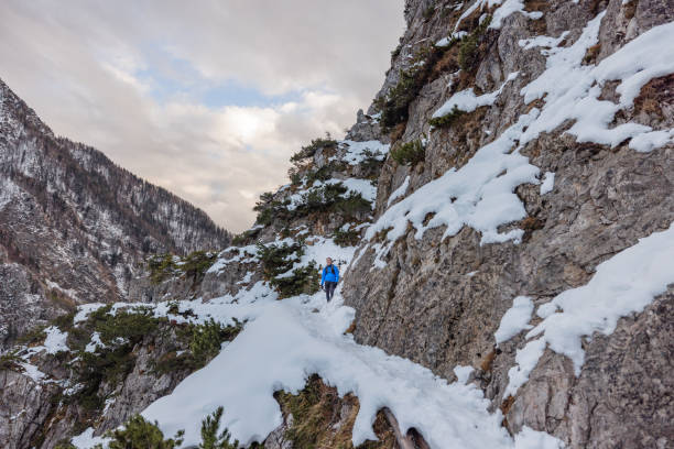 istock A Caucasian Trail Runner Pauses At Mountain Top In Winter 1387979425