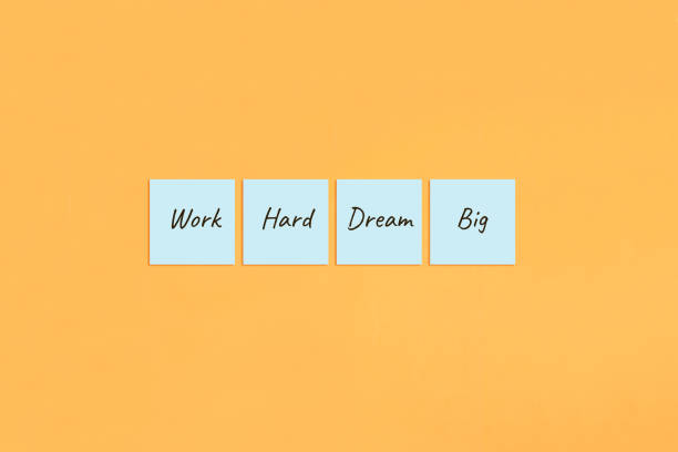 istock Motivational saying Work hard dream big 1387979513