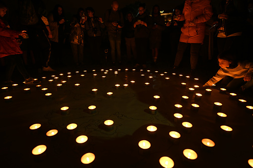 Lisbon, Portugal 26, March: People seen holding a candle light protest for Earth Hour on Saturday 26 March in Lisbon, Portugal. Earth Hour is an annual tradition started by the World Wildlife Fund (WWF) in 2007 in Sydney, Australia, to raise awareness about climate change. Participants in more than 190 countries will turn off their lights for one hour on Saturday.
