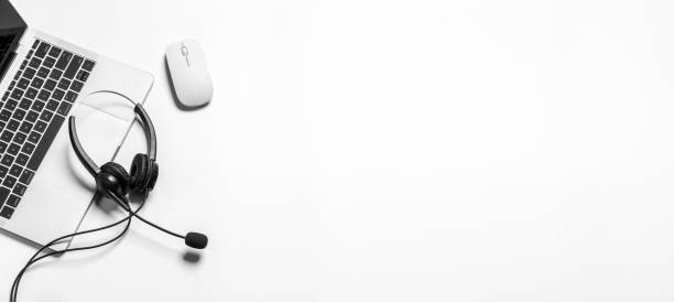 istock Headset and customer support equipment at call center ready for actively service , Communication support, call center and customer service help desk.for (call center) concept . 1387983372