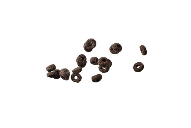 istock Chocolate rings cereal spill out into a bowl. Breakfast. 1387985099