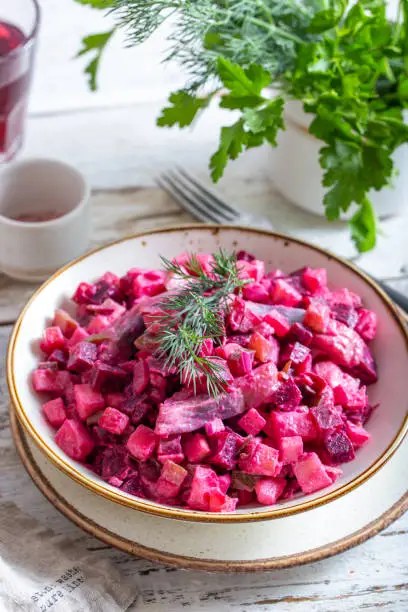 Swedish classic beet salad with herring, selective focus