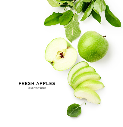 Fresh green apples with leaves creative layout isolated on white background. Healthy eating and food concept. Summer fruits composition. Flat lay, top view. Design element
