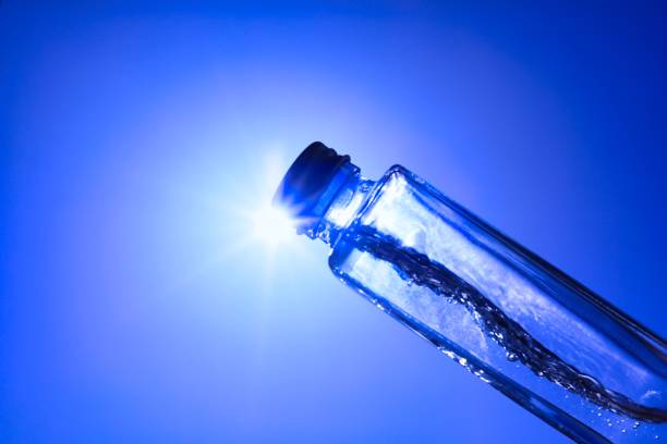 istock Liquids and bubbles in a blueback bottle 1387990844