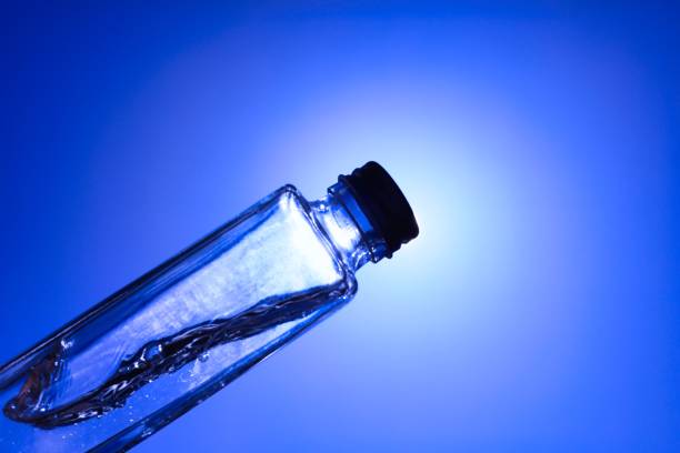 istock Liquids and bubbles in a blueback bottle 1387991051