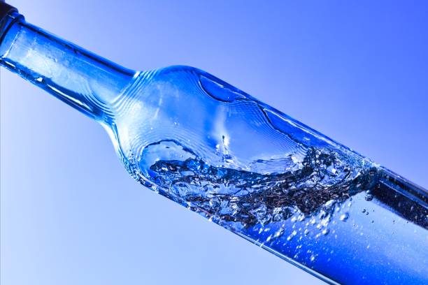 istock Liquids and bubbles in a blueback bottle 1387991399