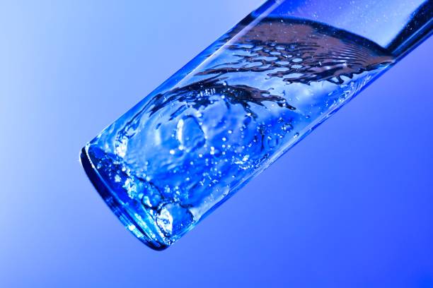istock Liquids and bubbles in a blueback bottle 1387991417