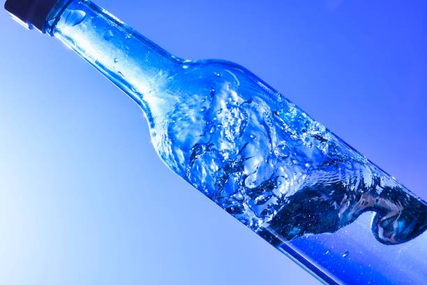 istock Liquids and bubbles in a blueback bottle 1387991436