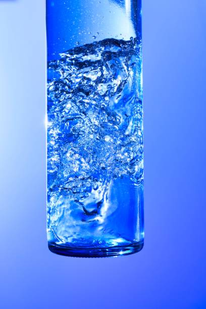 istock Liquids and bubbles in a blueback bottle 1387991449