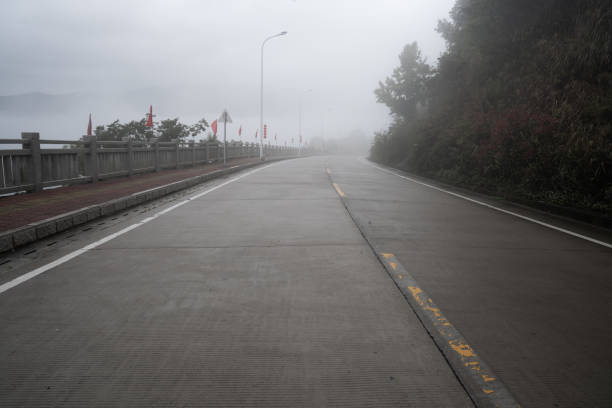 istock A road shrouded in fog 1387996095