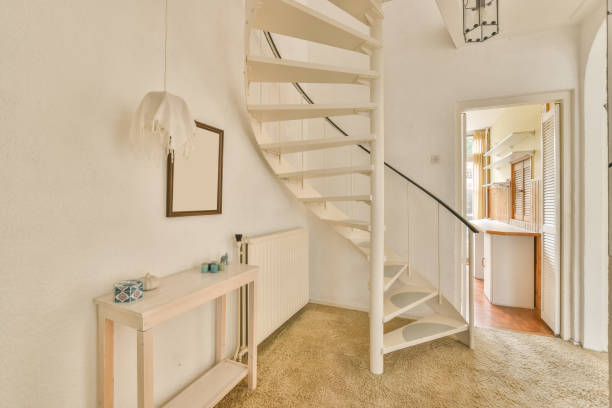 istock Spiral white staircase leading up 1388001259