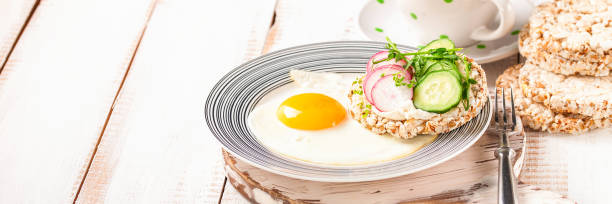 istock Toast with cheese, a cucumber and a garden radish 1388003024