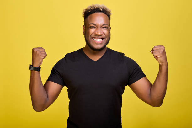 istock A tough black guy rejoices in his victory in competitions 1388007009