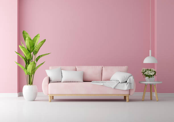 istock Pink sofa in pink living room with free space for mockup, 3D rendering 1388008528