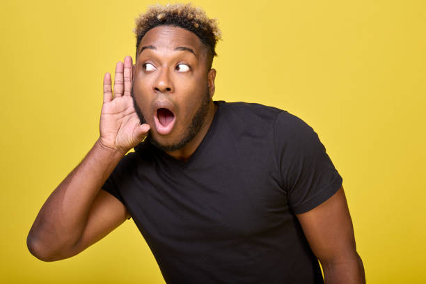 istock A stylish dark-skinned man in modern everyday clothes is very surprised 1388009278