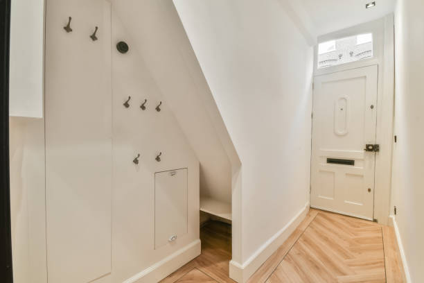 istock A narrow corridor with hooks for clothes 1388009788
