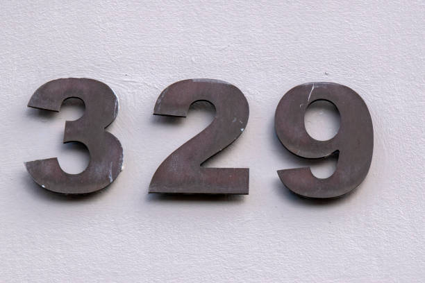 istock Close Up House Number 329 At Amsterdam The Netherlands 1388014664