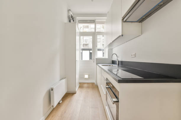 istock A narrow kitchen with a black marble countertop 1388015865
