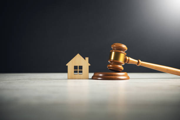istock Judge gavel with model of house 1388017032