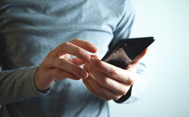 istock the business man using smartphone 1388017052