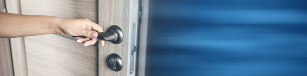 istock woman opening door 1388017059