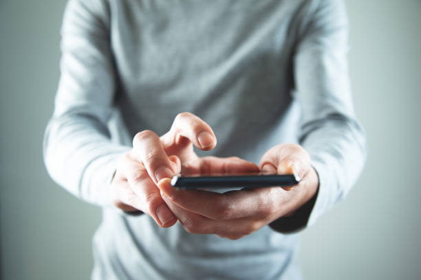 istock the business man using smartphone 1388017063