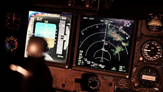 Commercial aircraft with close up the cockpit flight deck control panel