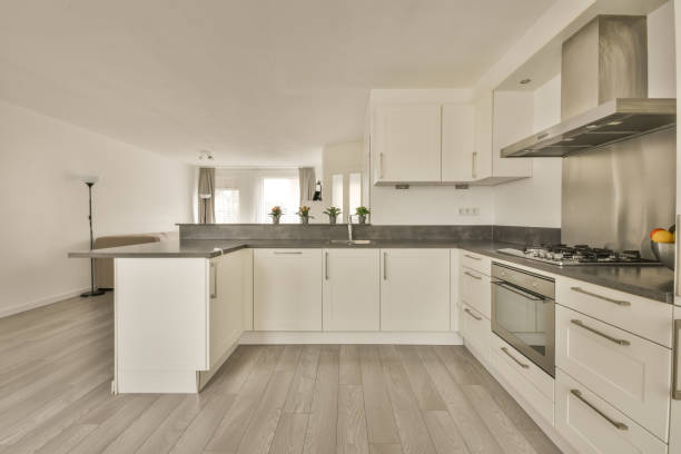 istock Kitchen interior with white furniture 1388021787