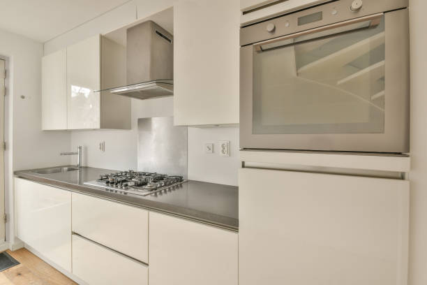 istock The interior of a small kitchen in white tones 1388024414