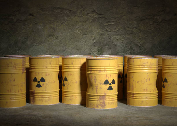 Yellow barrel radioactive Yellow rusty steel barrel with environmentally hazardous radioactive waste against the backdrop of a old concrete wall. 3D illustration biochemical weapon photos stock pictures, royalty-free photos & images