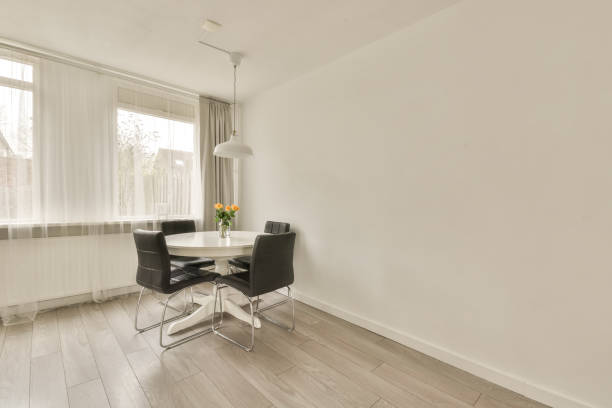 istock Interior of a dining area in white 1388025818