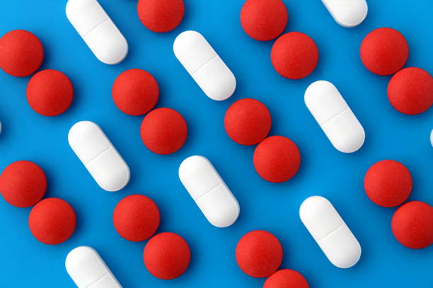 istock Texture from medicines in white and red colors. 1388027971