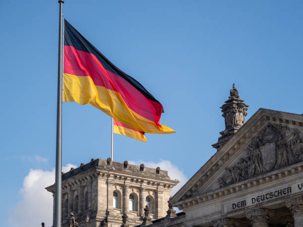 istock German Flag Flying Over Reichstag Bundestag 1388030007