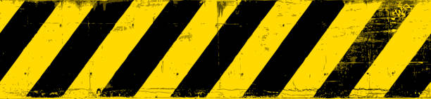 Danger! Seamless yellow and black grunge warning lines vector art illustration