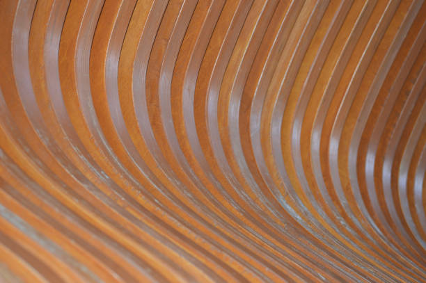 istock Wooden bench element, brown slats with a rounded edge. Abstract background. 1388032727