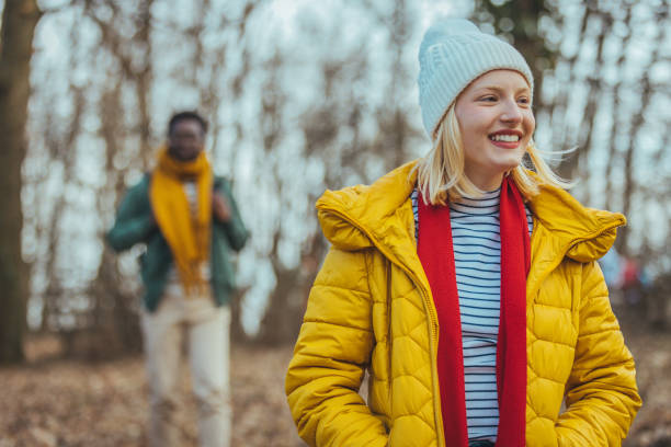 istock A couple of hikers exploring nature while walking in the woods 1388033650