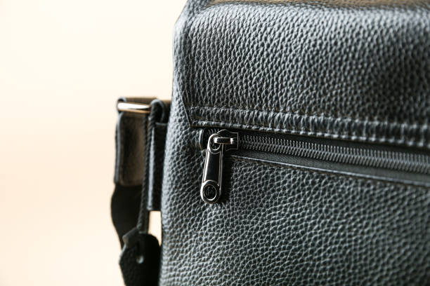 istock zipper on the bag close-up 1388033957