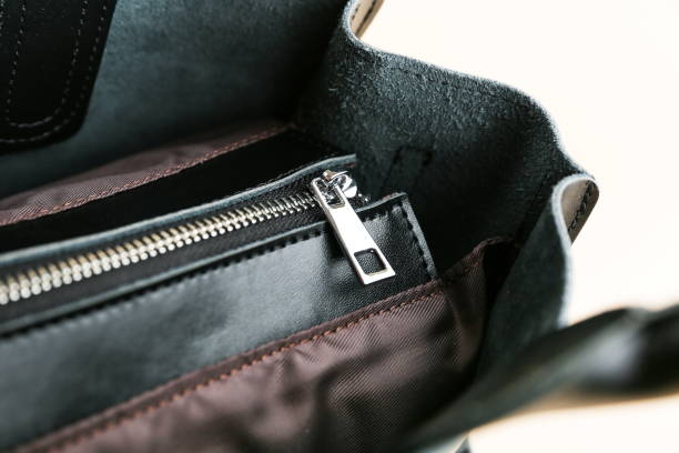 istock zipper on the bag close-up 1388033958
