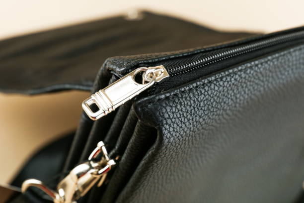 istock zipper on the bag close-up 1388033972